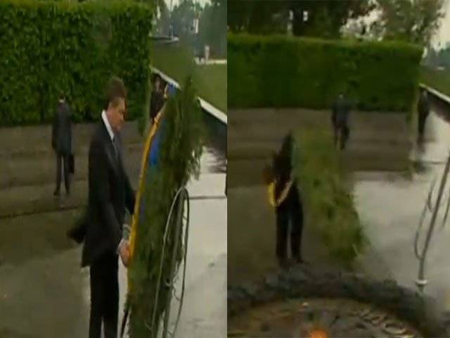 تیز ہوا کے باعث فوجی کے مقبرے پر رکھا جانے والا ایک بڑا گلدستہ یوکرائن کے صدرکے منہ پرجا لگا۔